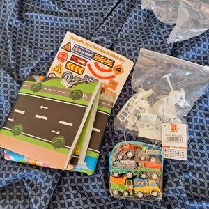 mini cars, signs with stickers and roadway